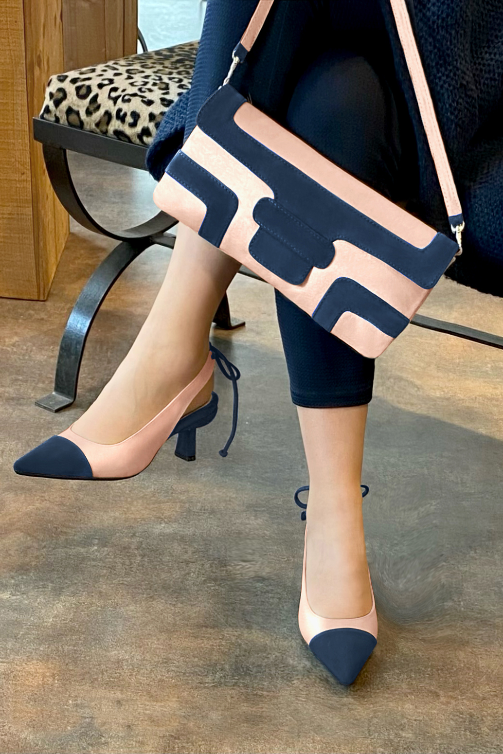 Navy blue and powder pink women's slingback shoes. Pointed toe. Medium spool heels. Worn view - Florence KOOIJMAN